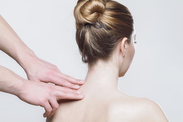 massaging shoulders